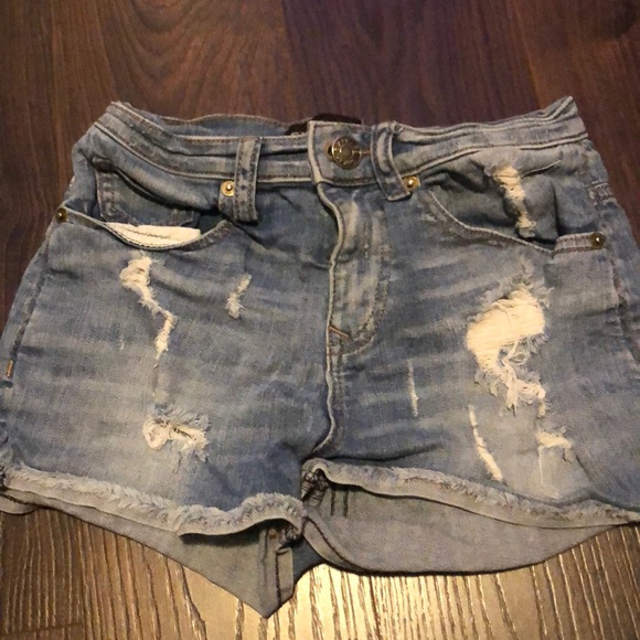 light wash ripped jean shorts